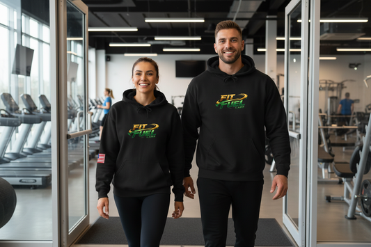 Couple walking into gym wearing Fit Fuel hoodies